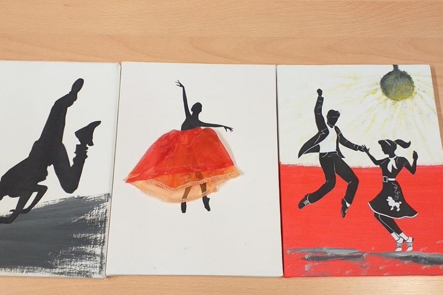 kartki z postaciami tancerzy w różnych pozach